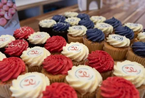 Cupcakes with Kings Award and One Big Circle logos.